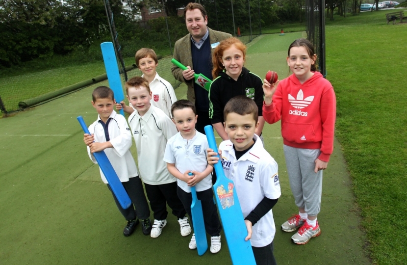 Cllr. McNeill with members of Nettleham Cricket Club Juniors