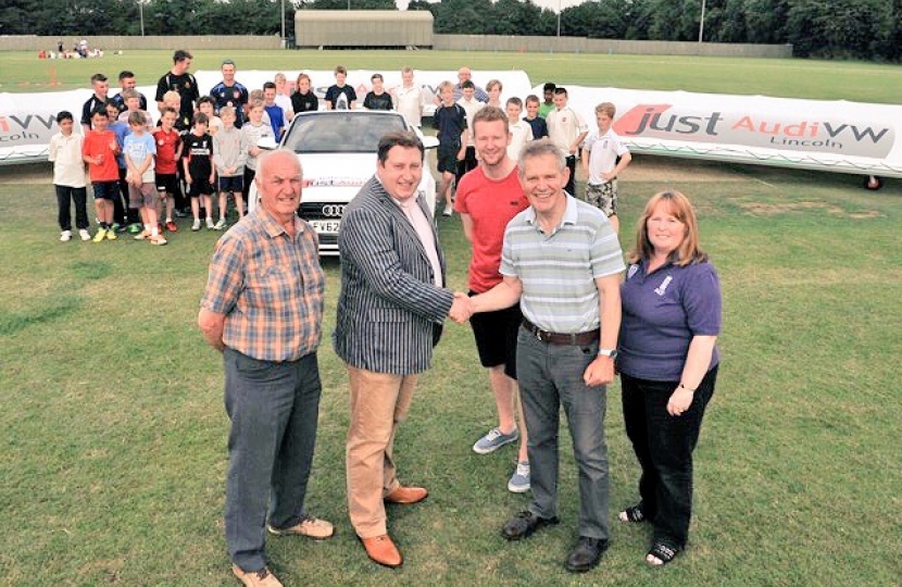 Cllr. McNeill shakes hands with Nettleham Cricket Club's David Wheatley