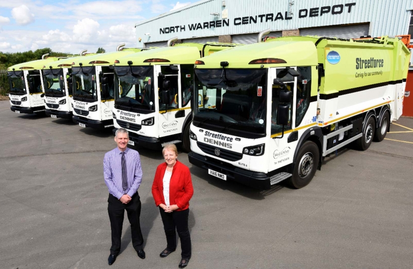 Sheila Bibb in front of West Lindsey's fleet of refuse freighters