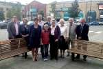 Councillors and Family Members with the two benches in Marshall's Yard